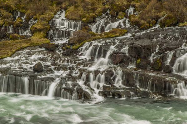 Iceland, Hraunfossar Waterfalls into stream